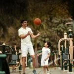 Colorful and safe children's play area at Adarsh Welkin Park, equipped with slides, swings, and play structures.